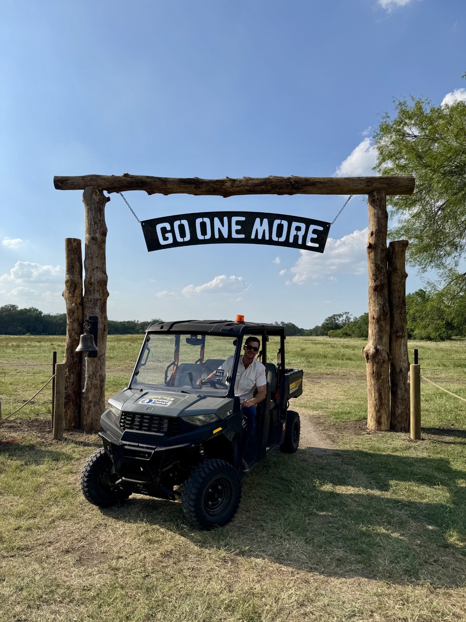 Go One More ranch entrance with Verde project vehicle at Bare Ranch